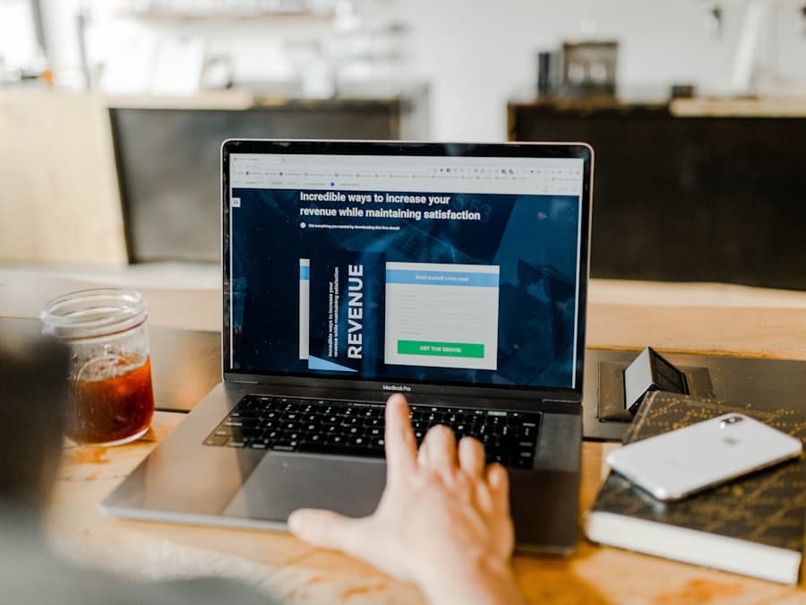 A laptop showing a landing page with a prominent call to action.